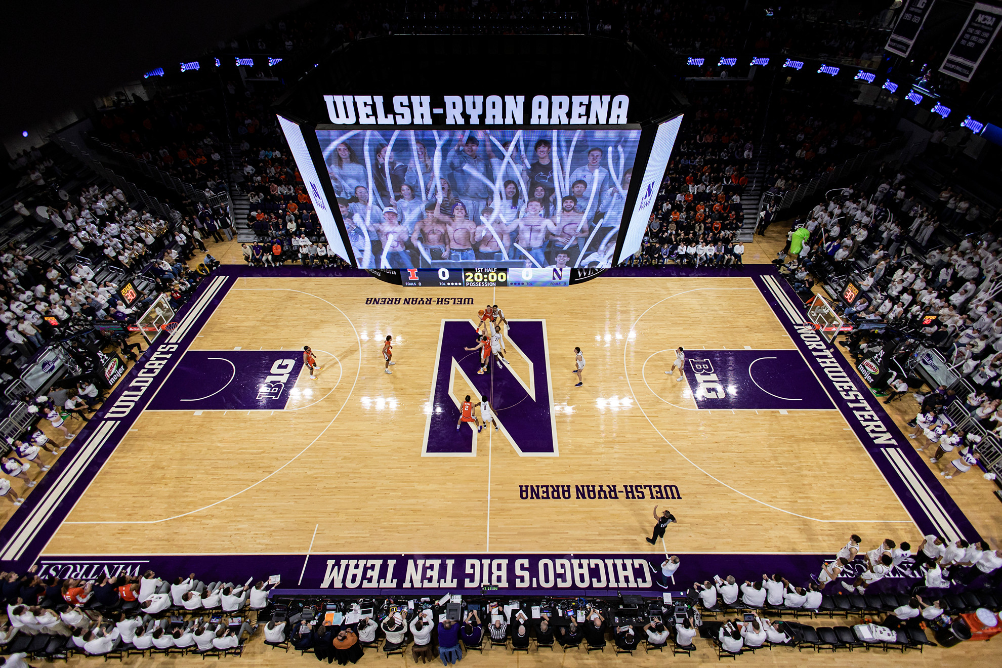 A look from the catwalk of Welsh-Ryan Arena at the court's center circle for the opening jump ball.